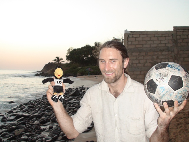 Andrew on Ngor beach with the Pauli's mascot