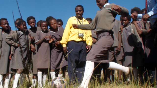 School girls line up to kick The Ball in Lusaka 