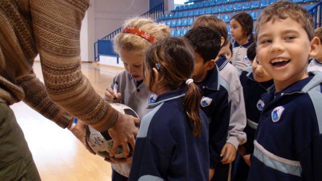 Children at the Laude school sign The Ball