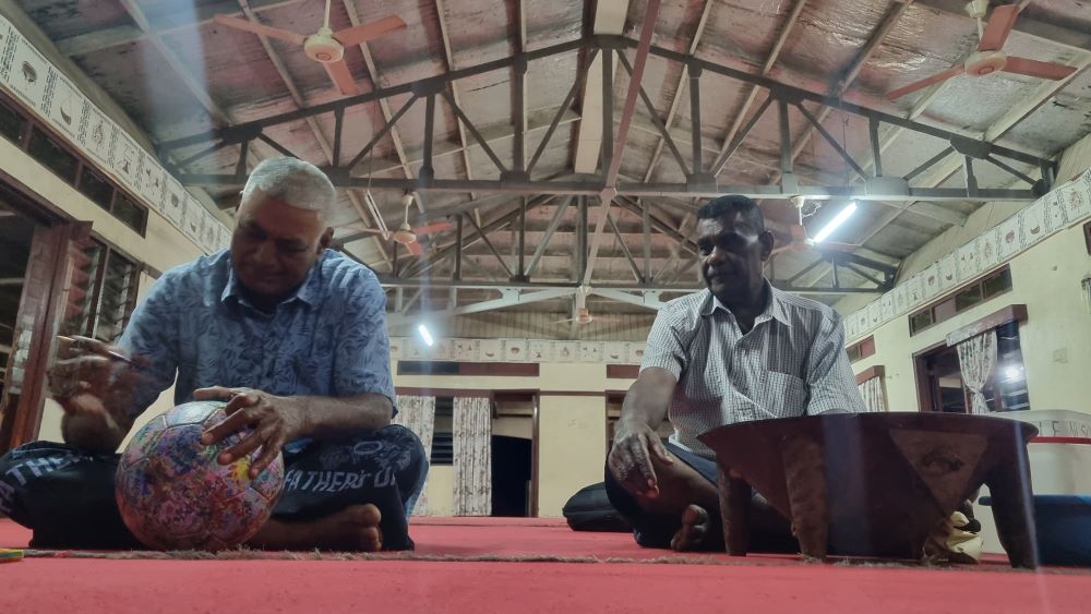 The village elders signing The Ball