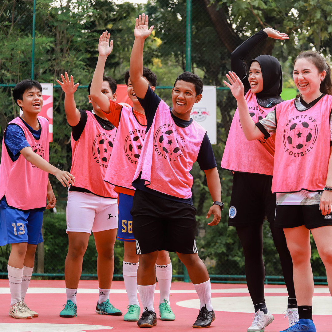 Arena FC and Persocci Players Celebrating Together