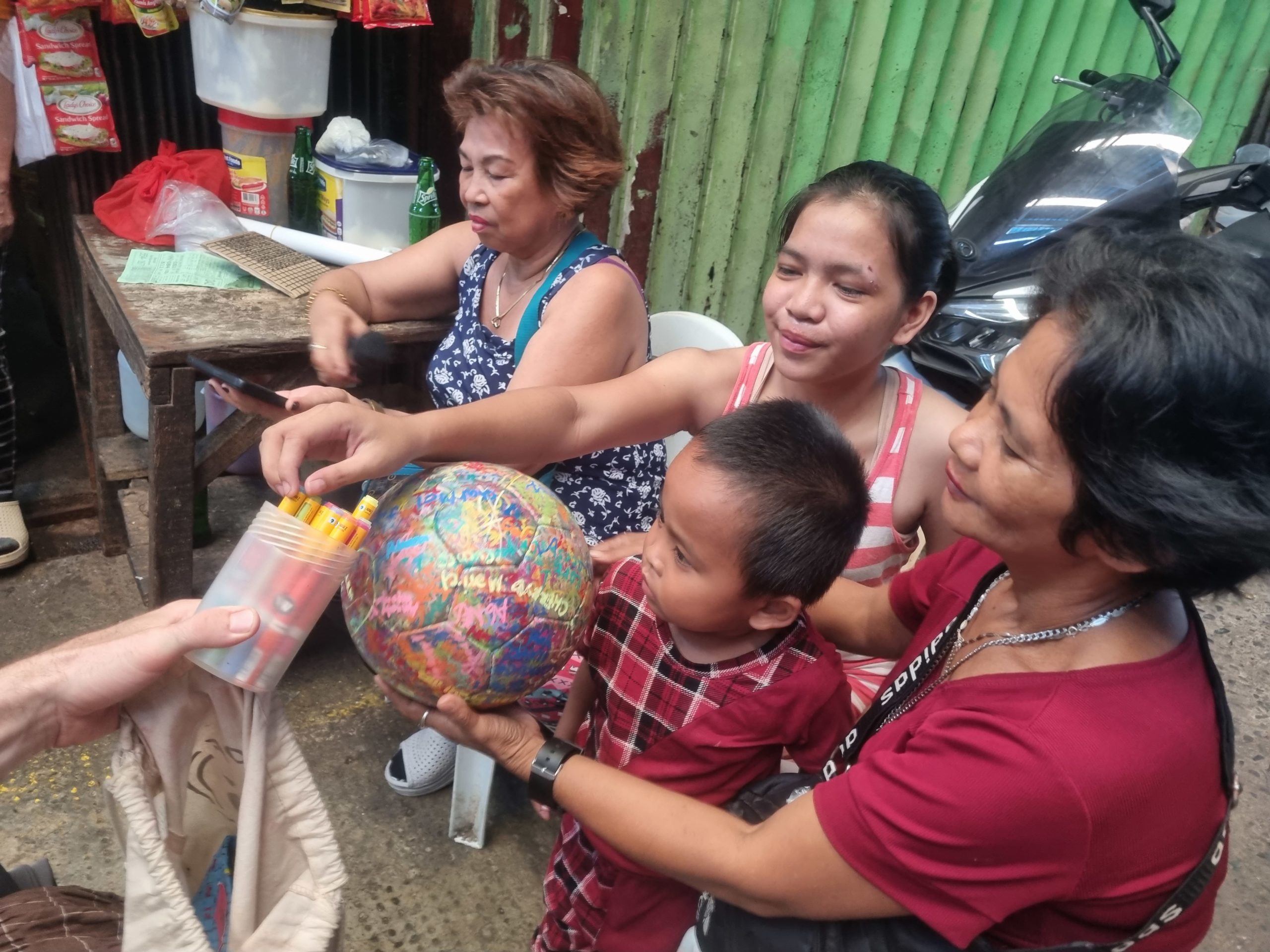 signing the ball Cebu family