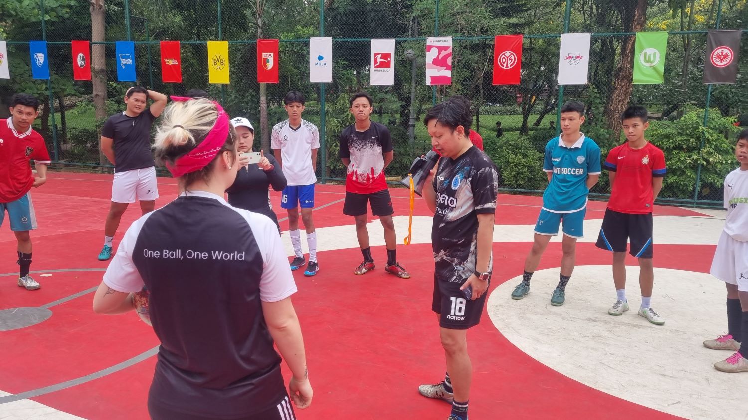 Coach Val getting the teams ready