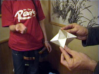 A stellated cube made from a single square, no cuts, no glue