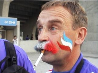 A French supporter makes good use of his assets
